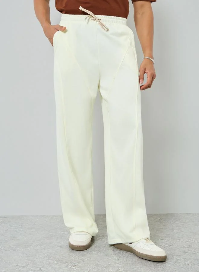 Styli  Men Cream Solid Relaxed Fit Joggers for Men | Best Price UAE
